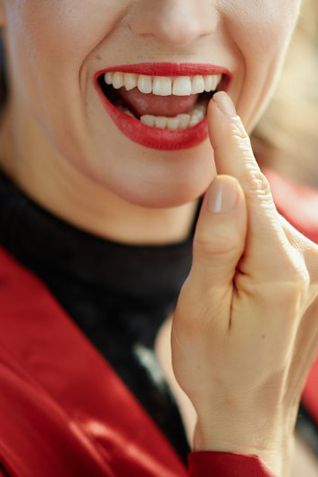 Patient in Yarmouth smiling with their dental bridges