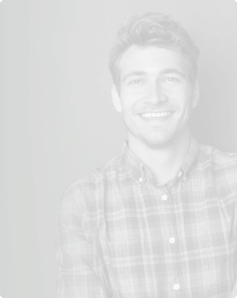 Smiling man in plaid shirt
