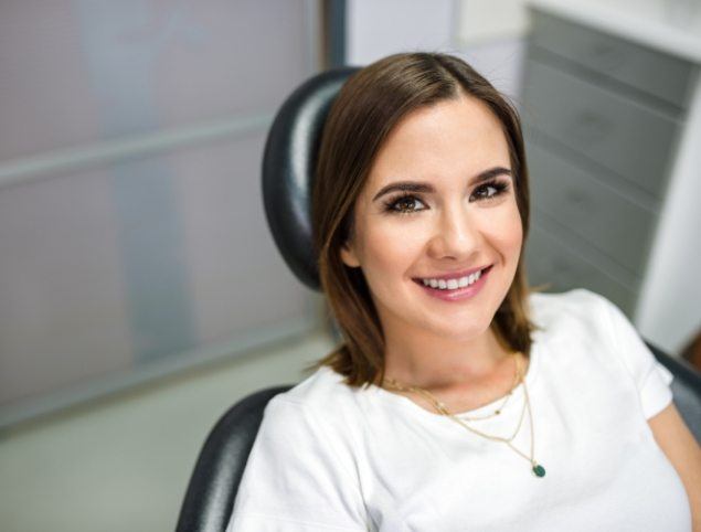 Woman smiling in dental chair at Yarmouth dental office
