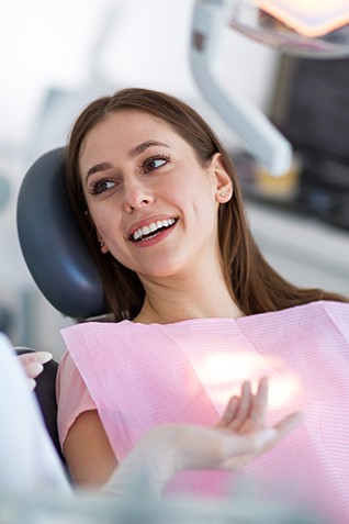 Woman smiling in the dental chair